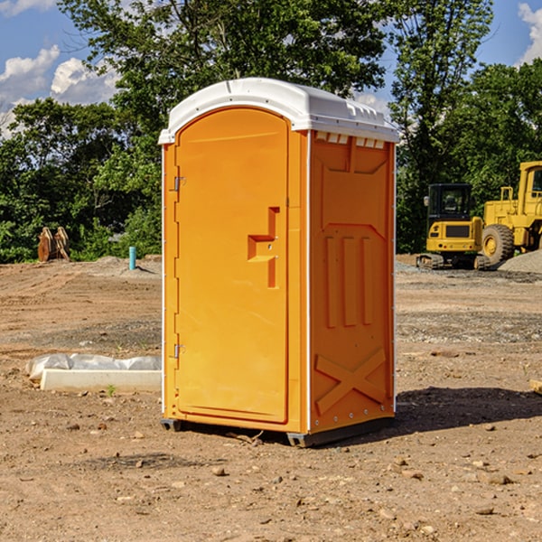 how often are the portable restrooms cleaned and serviced during a rental period in Orange Lake Florida